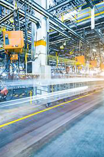Mechanical hands working in a factory