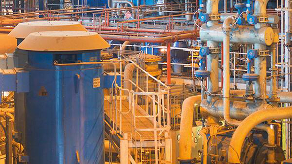 Pipes and tanks in an oil rig