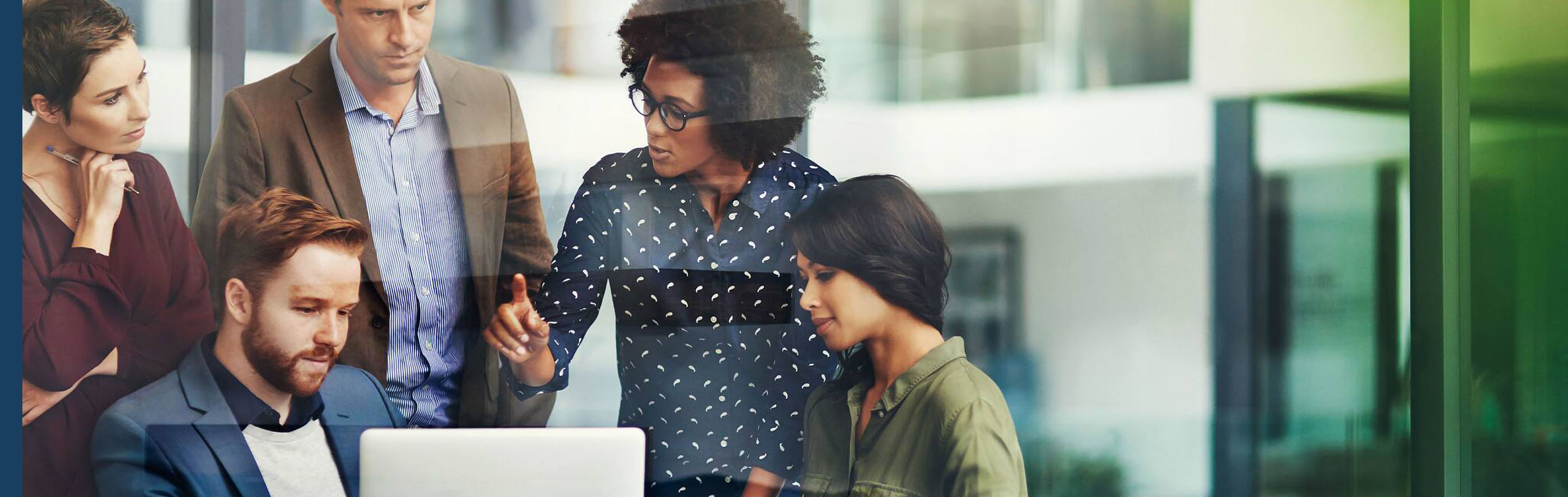 Group of employees having a meeting in office