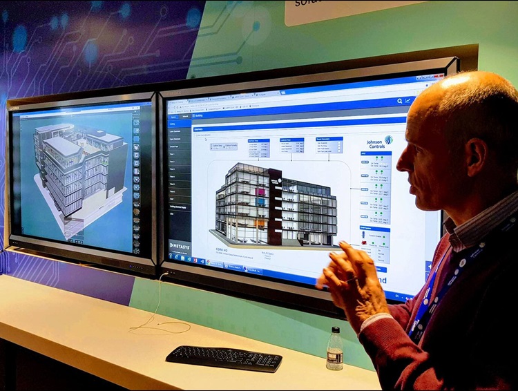 Johnson Controls employee giving a presentation on Metasys feature