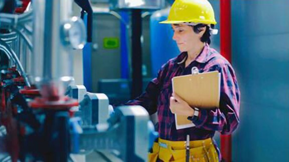 An engineer checking an hvac equipment