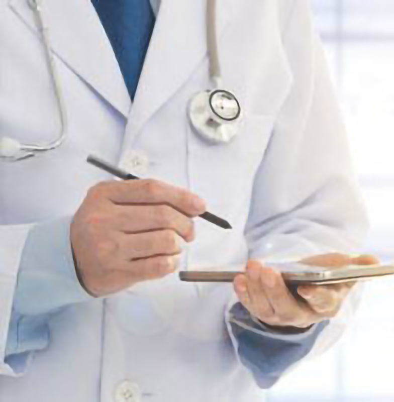 A doctor holding a stylus in his hands and  writing down notes in his smartphone