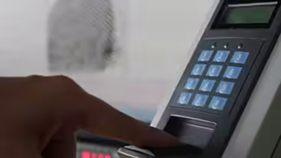 A person using an access control device