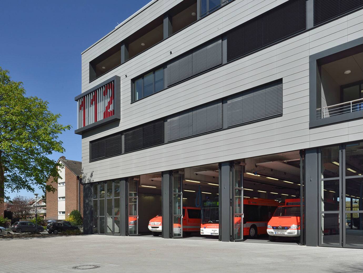 Fire trucks parked inside a fire station