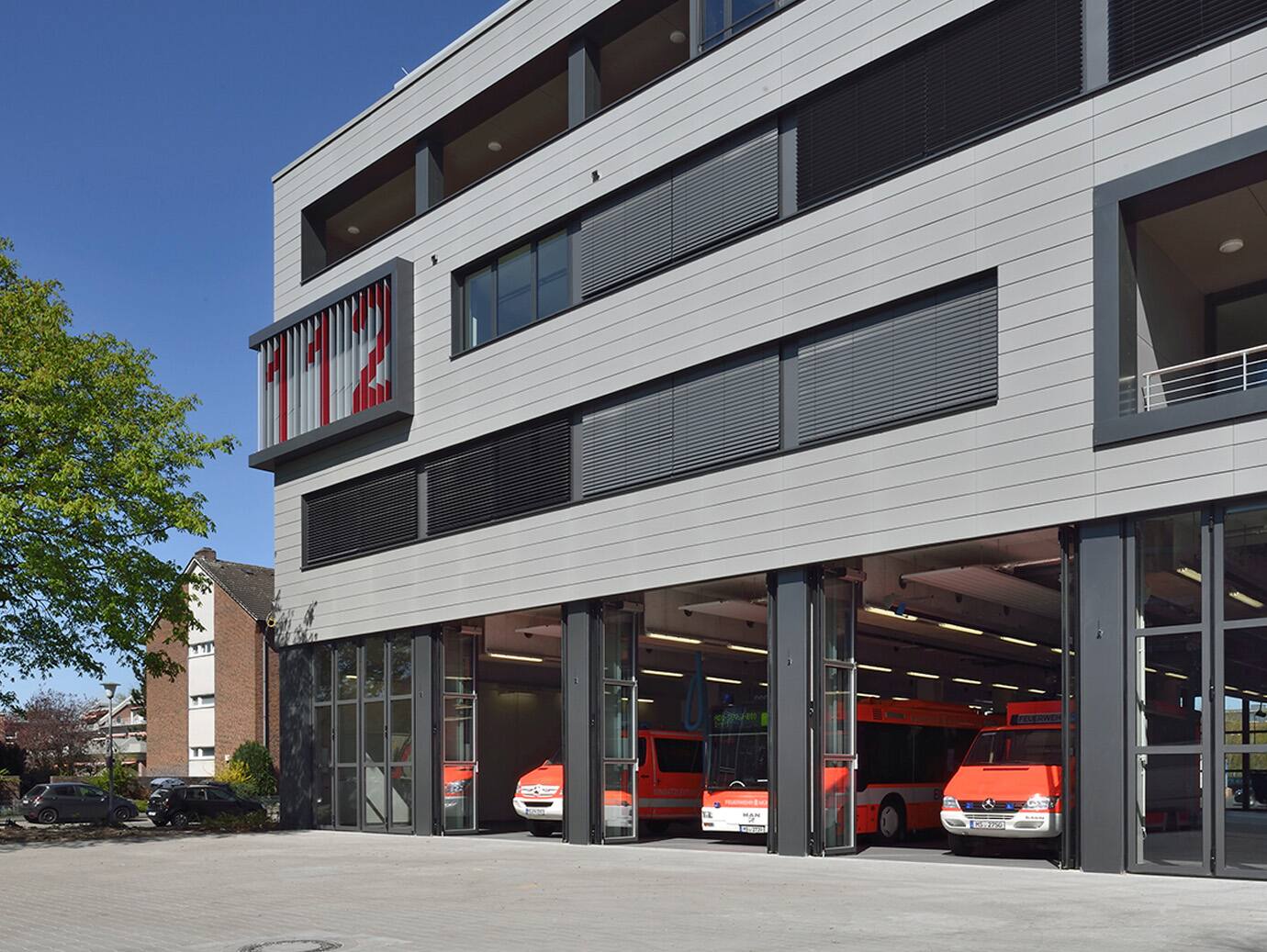Fire trucks parked inside a fire station