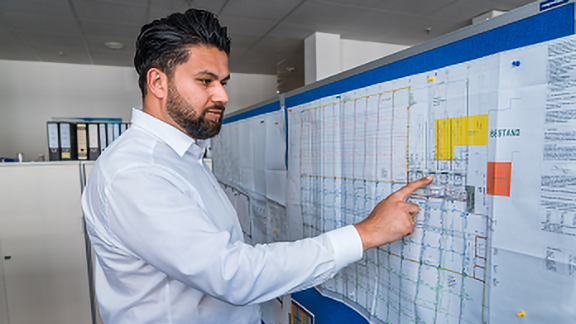 Man looking at the chart with diagram