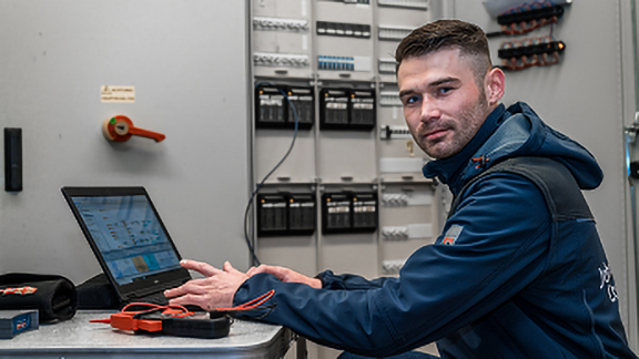 Technician working on a laptop