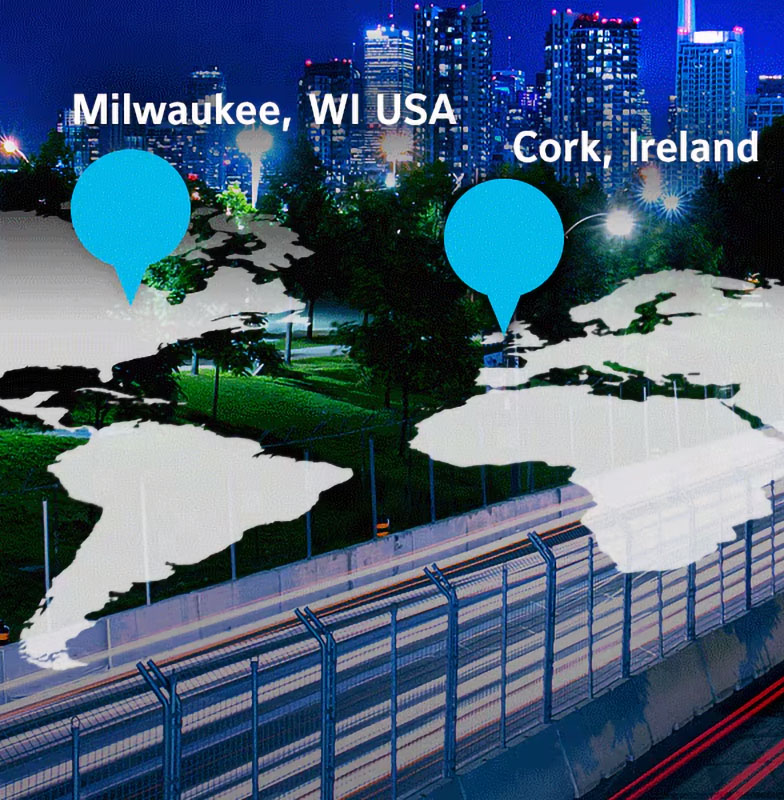 A world map overlaid on an image of a city at night