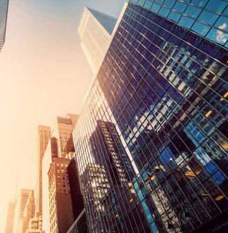 Frog's eye view of the skyscraper in bright sunlight